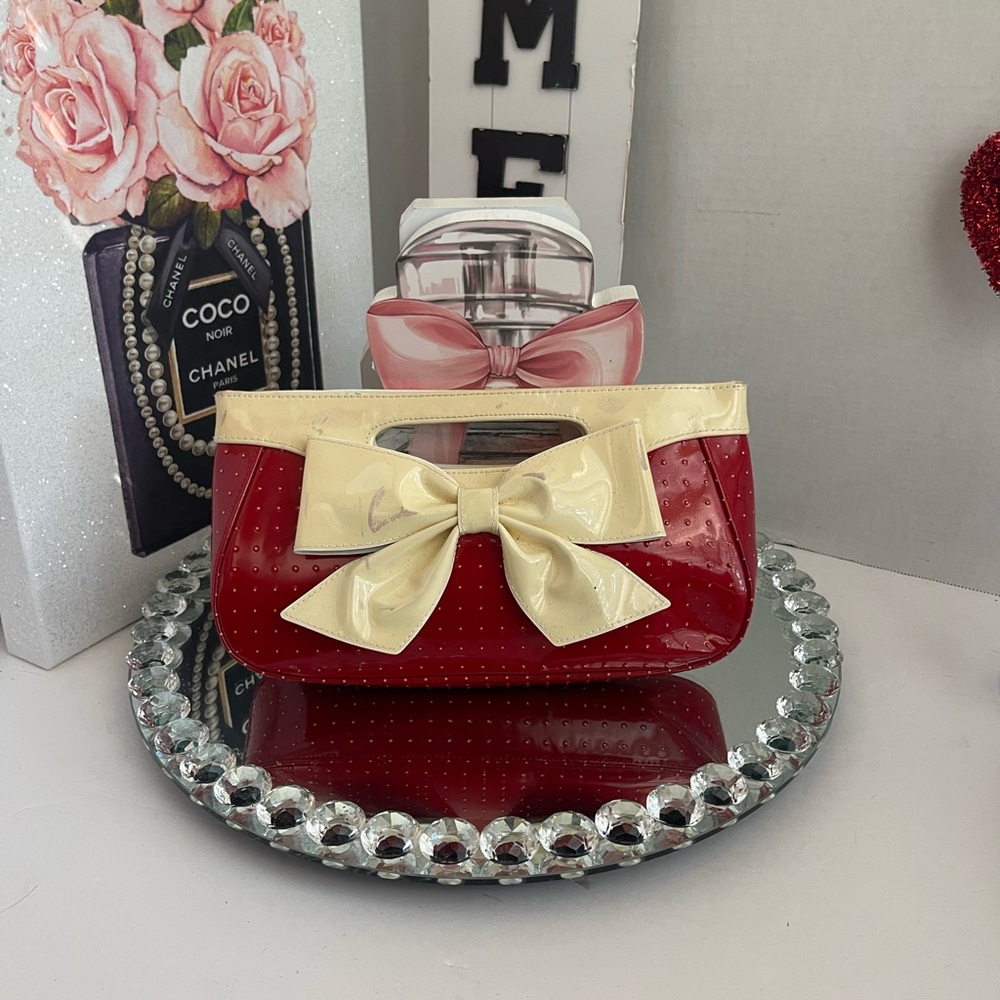 Isabelle Fiore Red and Cream Bow Clutch bag